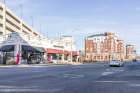Image of some road side commercial spaces and houses in Falls Church VA