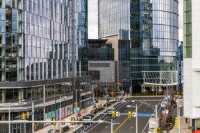 Mclean, Virginia USA Dec 7, 2023 Modern office buildings with a parking garage on the lower floors on Capitol One Drive in downtown.